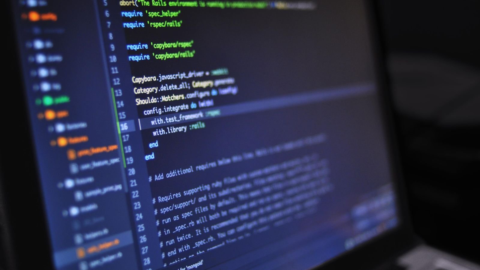 Source code on a monitor in a dark room